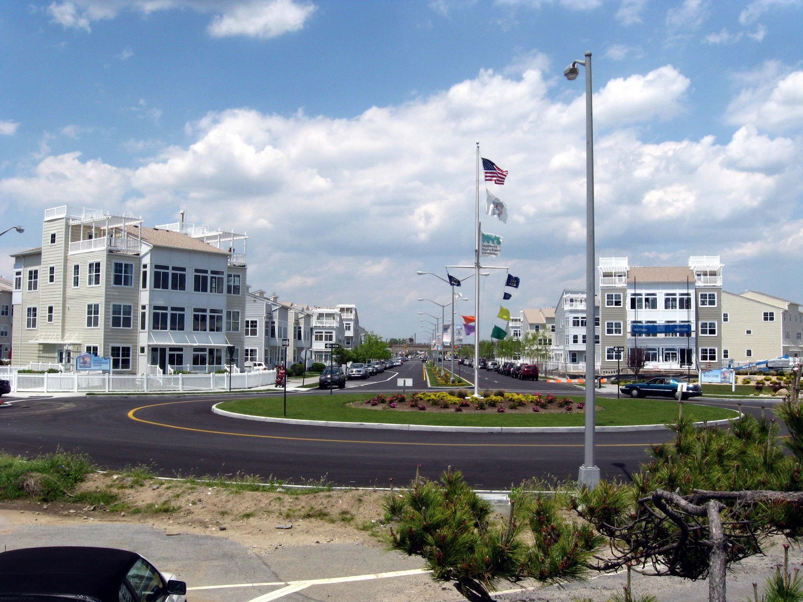 Pale multistory homes around the Beach 73rd Street roundabout at Arverne by the Sea, June 2008.