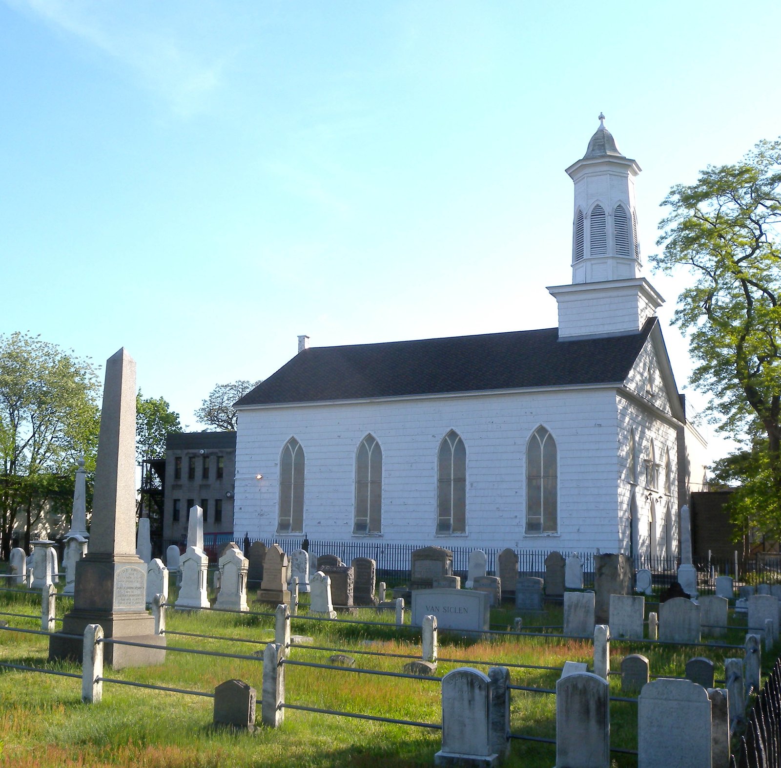 New Lots Reformed Church seen across the adjoining graveyard, photographed in 2009.