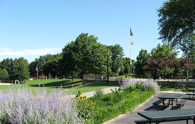 Planting beds, picnic tables and lawns at Juniper Valley Park.