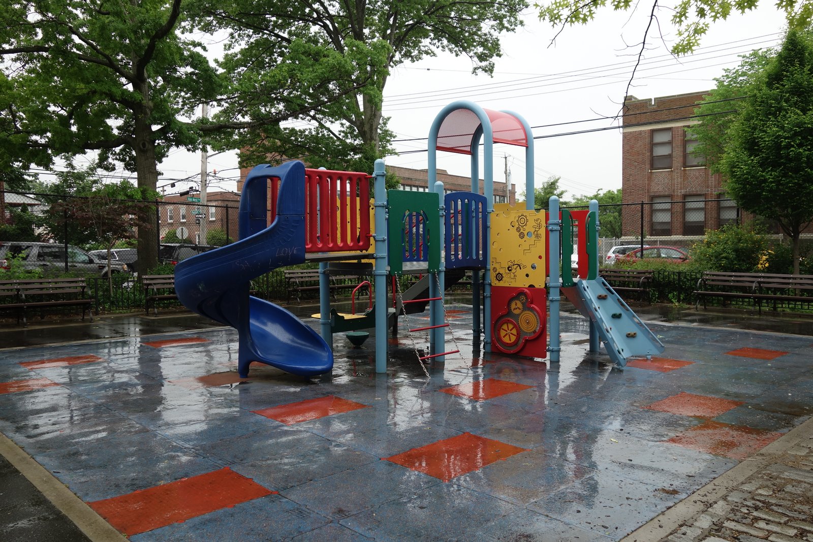 Play equipment in Loreto Playground by Van Nest and Haight avenues, photographed in 2019.
