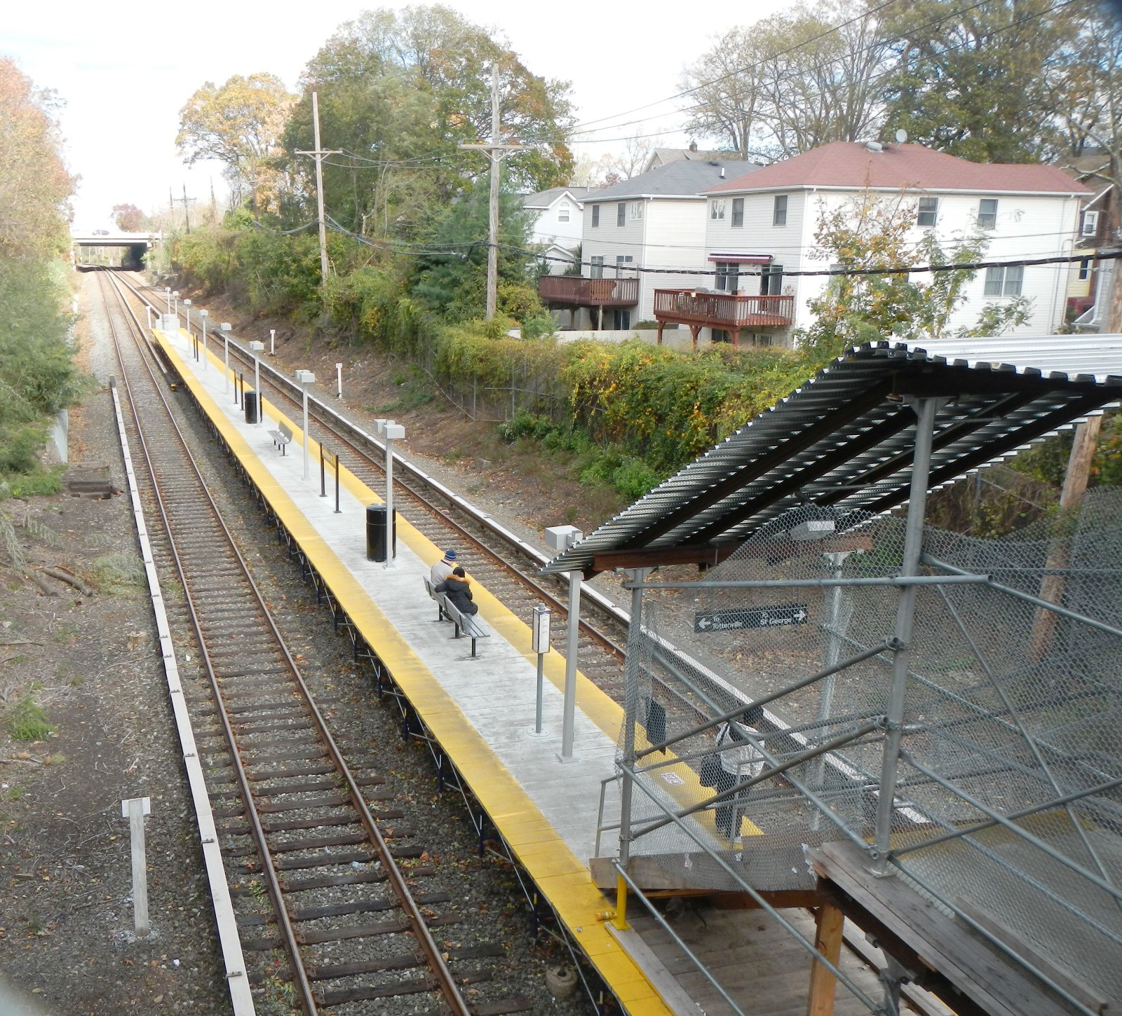 Grasmere station platform and stairway below Clove Road, with adjoining houses, photographed in 2012.