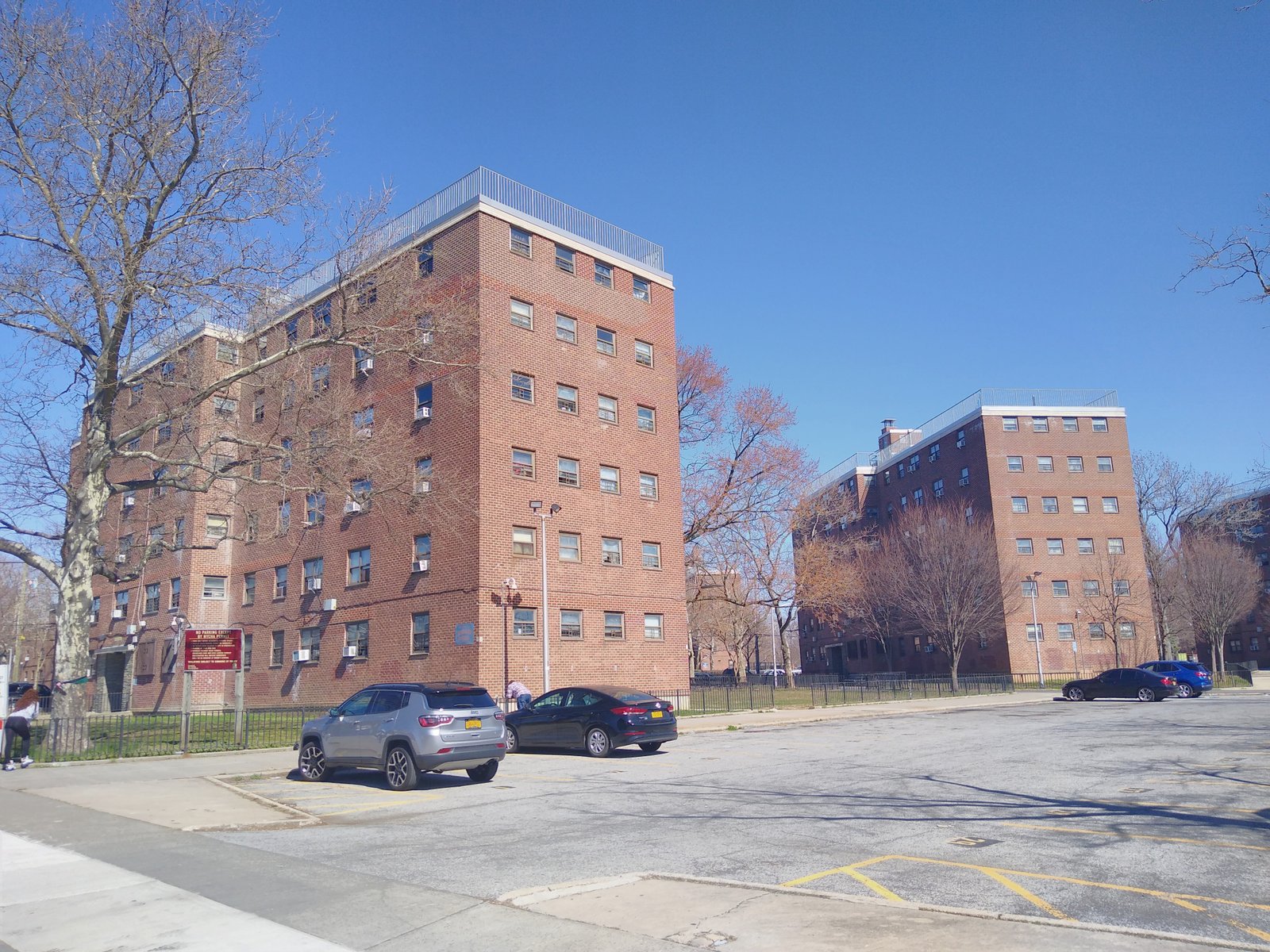 Brick apartment buildings of Mariners Harbor Houses seen from Grandview Avenue in 2020.