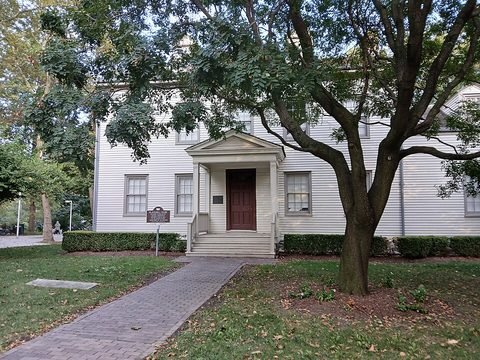 Blackwell House, a clapboard farmhouse with a pedimented front entrance on Roosevelt Island.