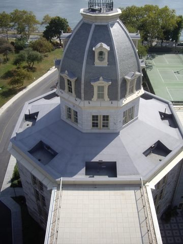 The Octagon?s restored gray tower and roof on Roosevelt Island, seen from above.