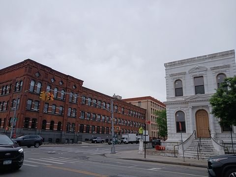 Somers Brothers Tinware Factory (red brick building at left), photographed in 2026