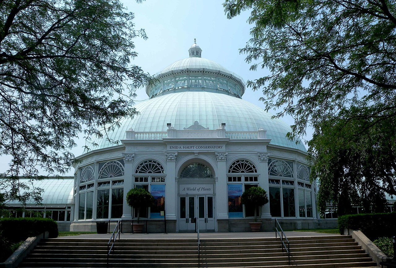 The glass dome and wings of the Enid A. Haupt Conservatory at the New York Botanical Garden