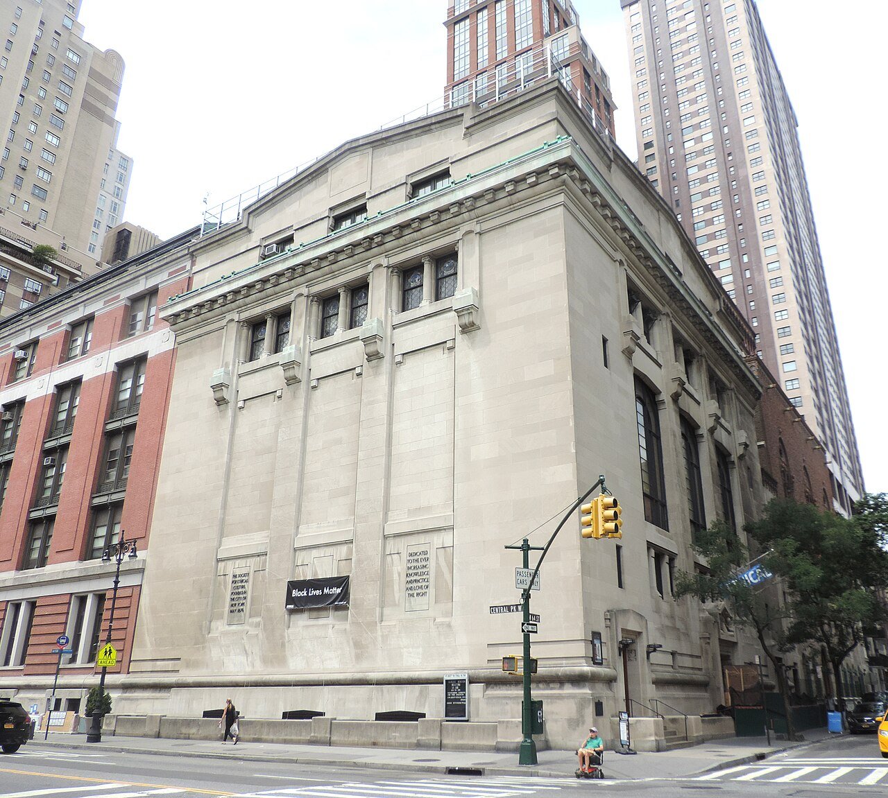 Ethical Culture meeting house's solid park-facing wall and arched entrance front in 2016