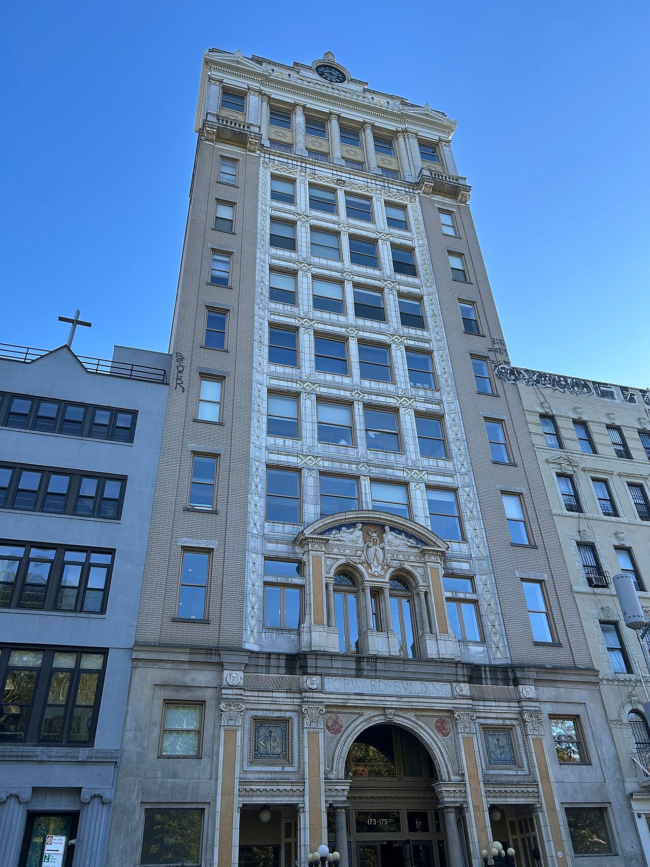 Forward Building's full East Broadway facade and ornate upper stories in 2025