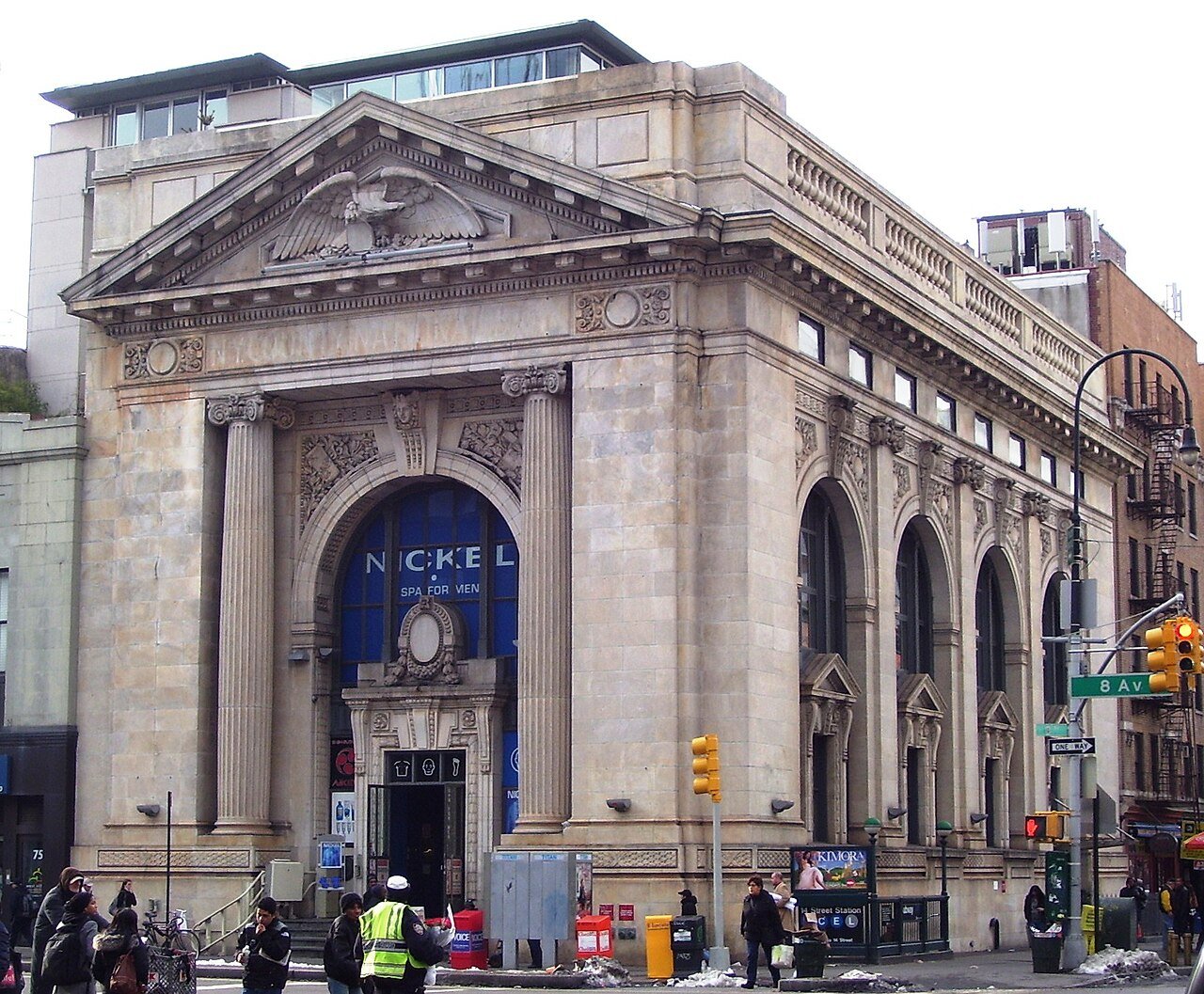 Former New York County National Bank's columned corner facade in 2011, before the Museum of Illusions opened