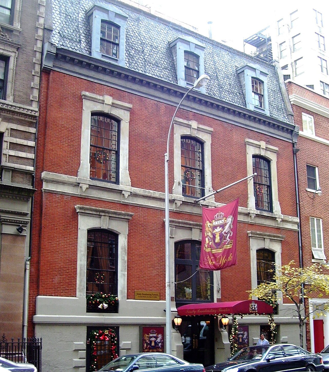 Former Century Association clubhouse's brick facade and slate dormer roof on East 15th Street in 2010