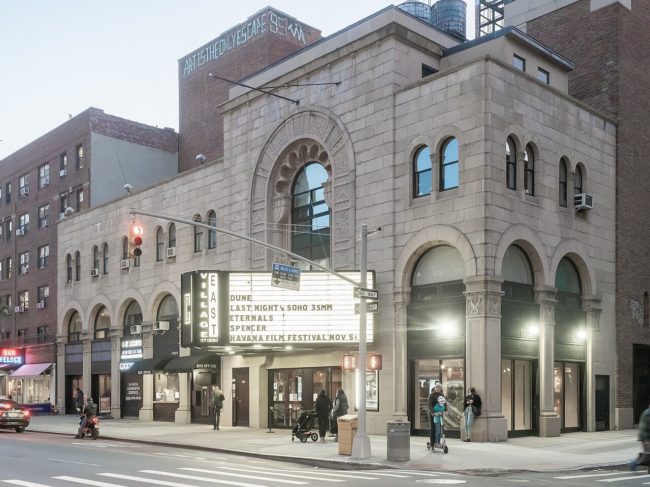 Louis N. Jaffe Art Theater's decorated corner facade and Village East cinema marquee in 2021