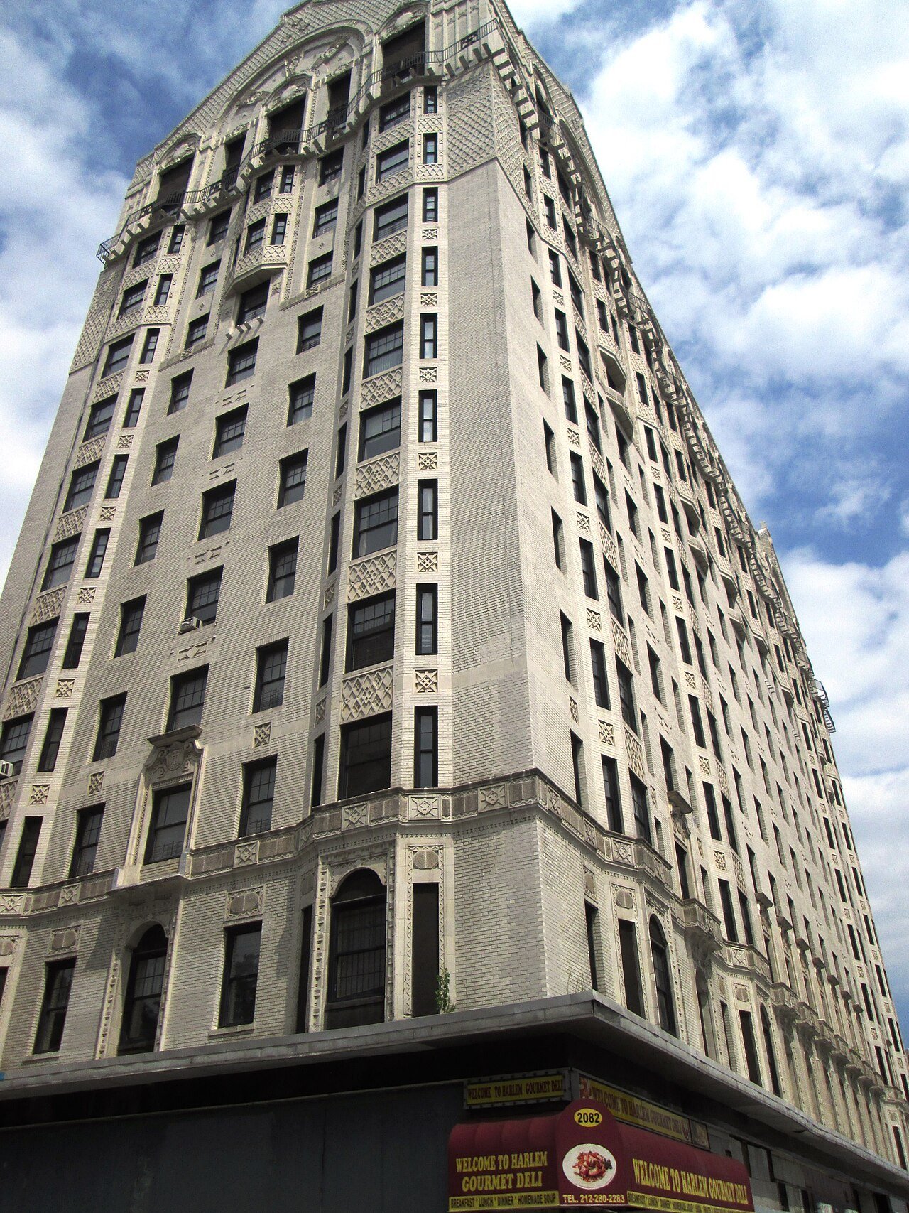 Former Hotel Theresa's white facade and curved upper gables in 2013