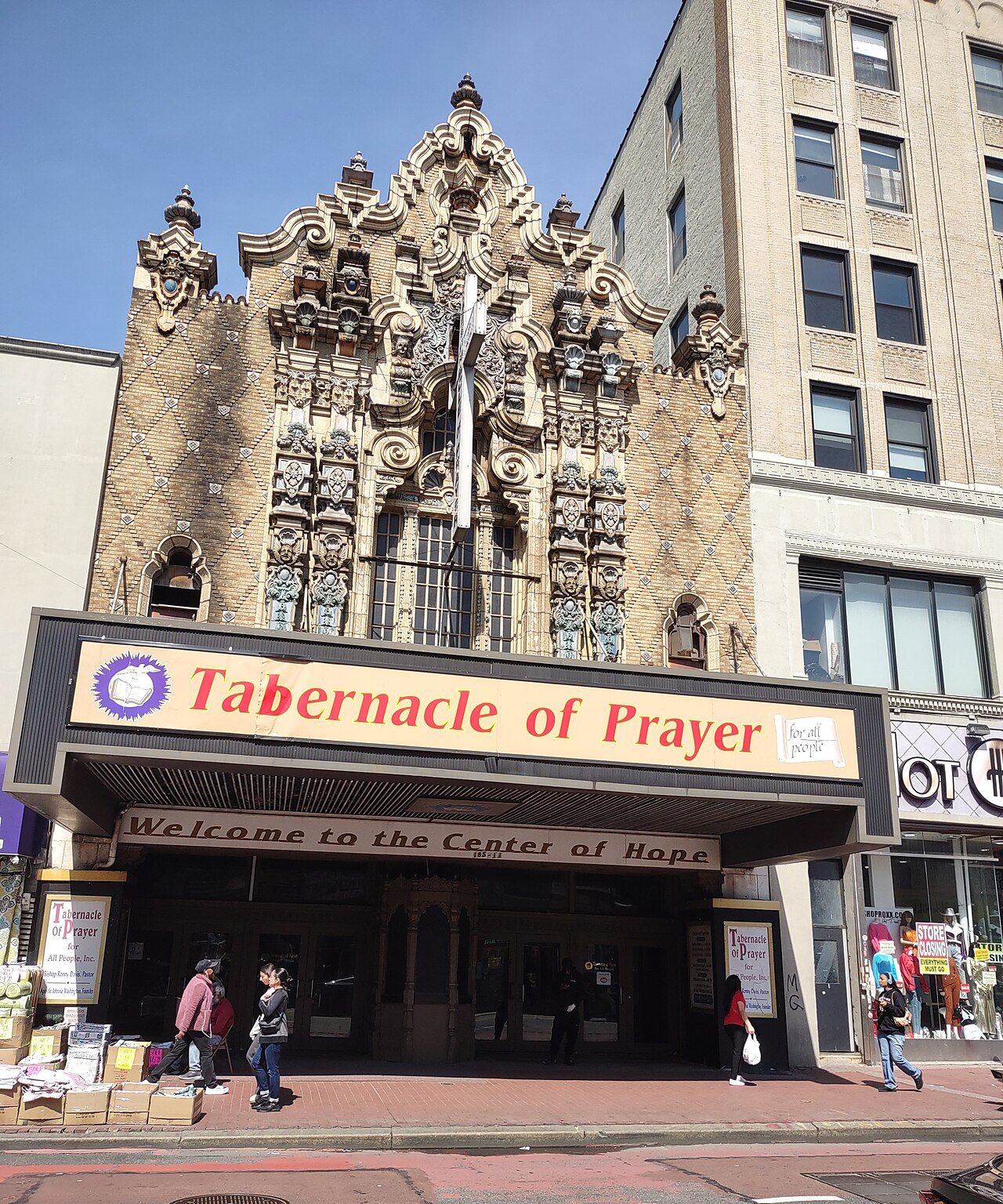 The former Loew’s Valencia Theater facade, now Tabernacle of Prayer, photographed in 2025