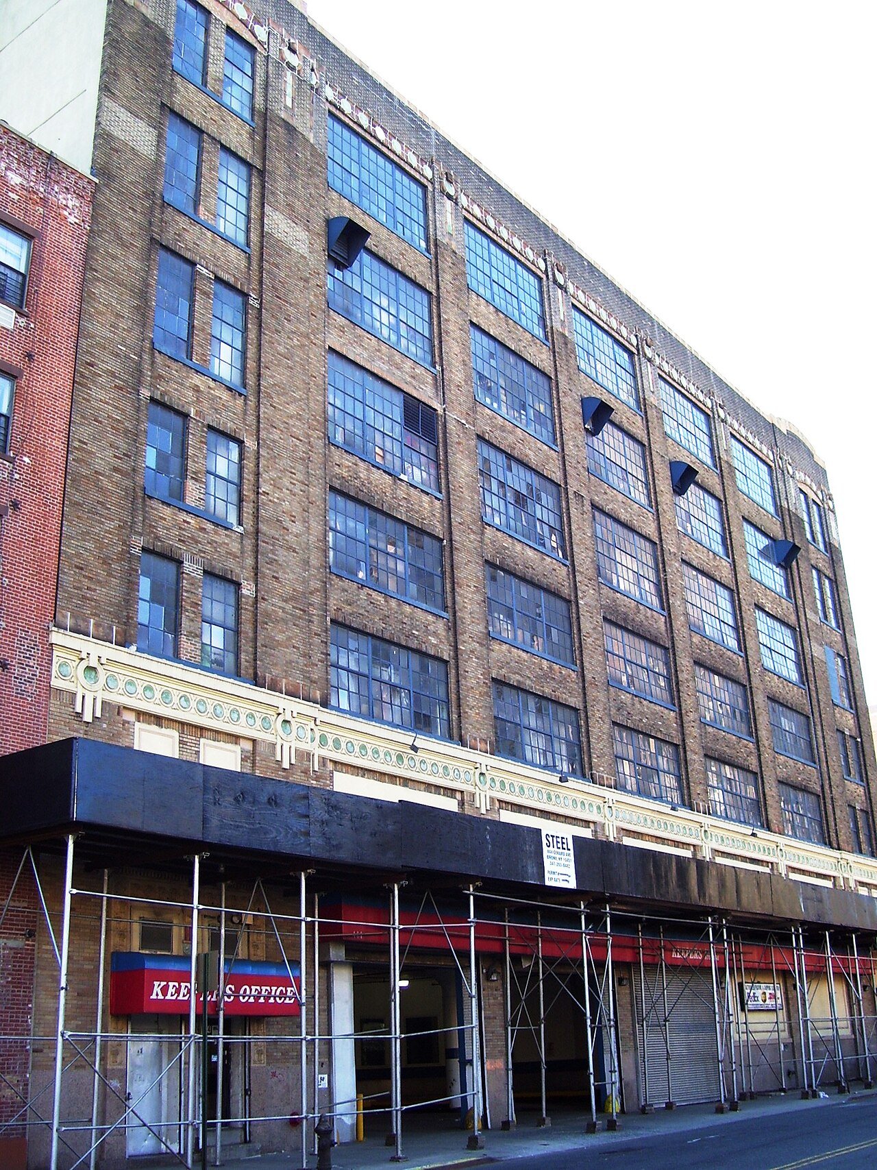 Wheatsworth Bakery building, its large factory windows and ceramic bands in 2011