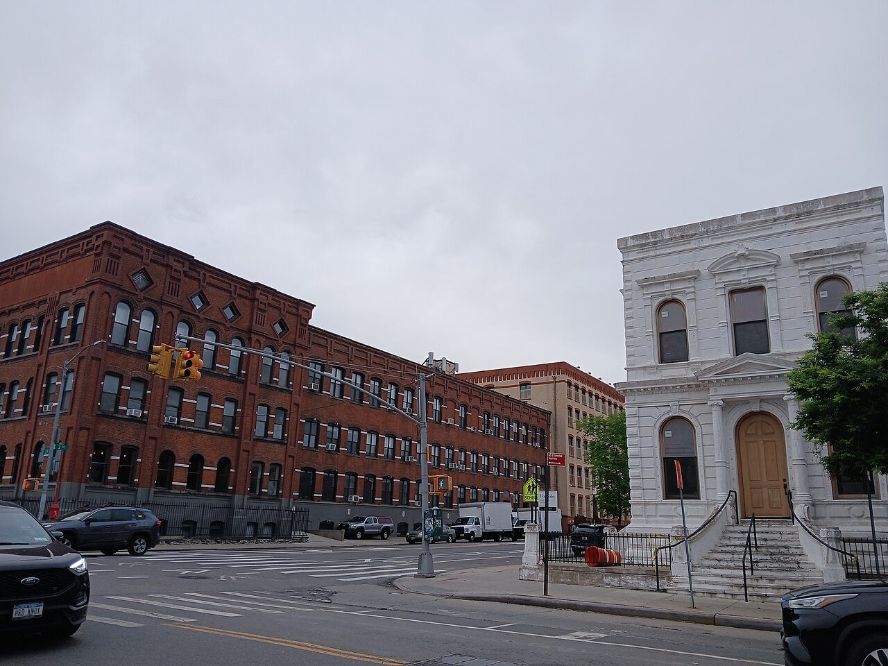 Somers Brothers Tinware Factory (red brick building at left), photographed in 2026